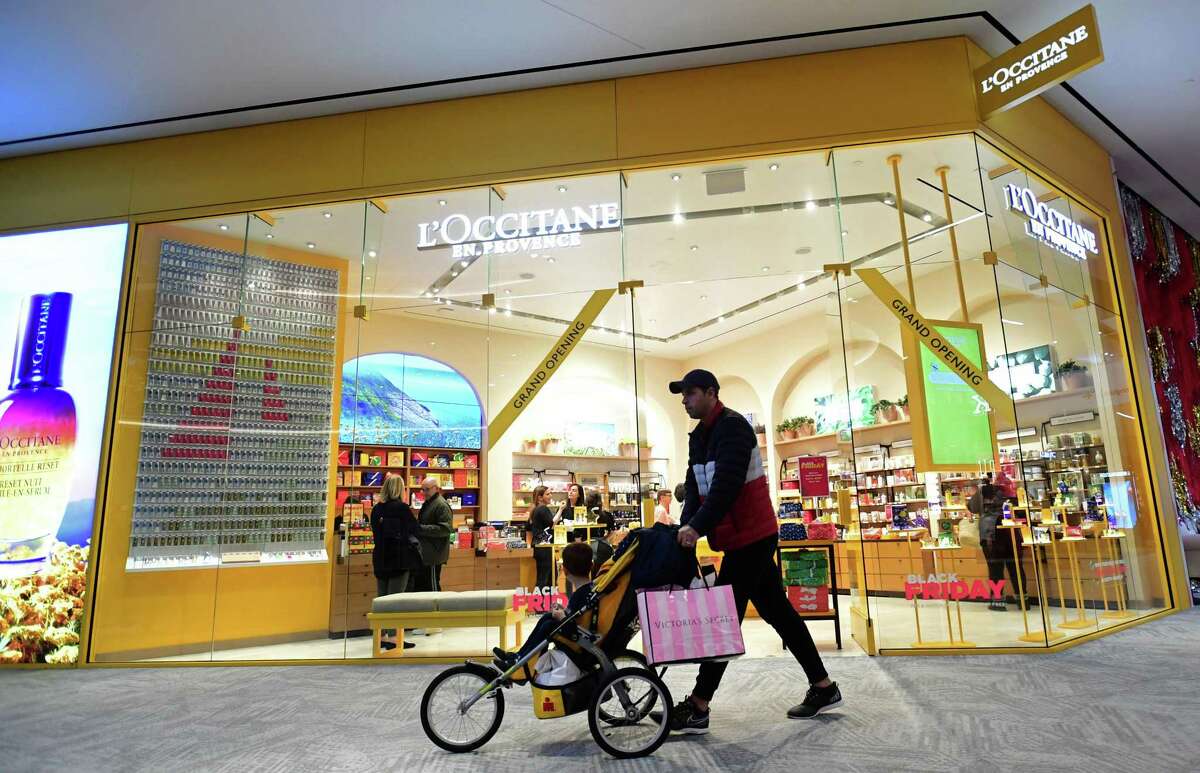 Shoppers search for Black Friday deals at the SoNo Collection mall Friday, November 29, 2019, in Norwalk, Conn.
