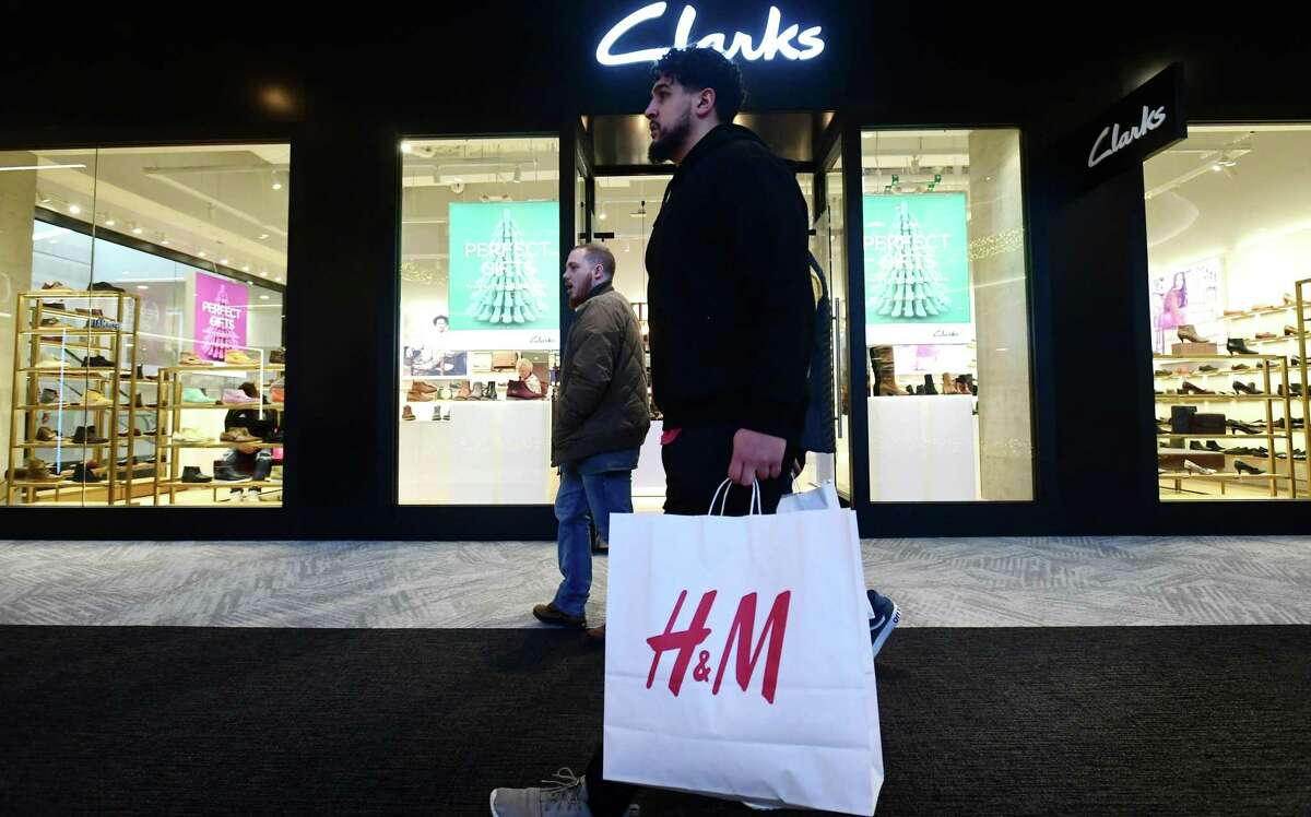 Shoppers search for Black Friday deals at the SoNo Collection mall Friday, November 29, 2019, in Norwalk, Conn.