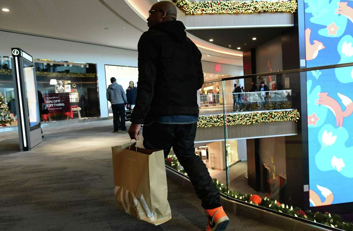 Shoppers search for Black Friday deals at the SoNo Collection mall Friday, November 29, 2019, in Norwalk, Conn.