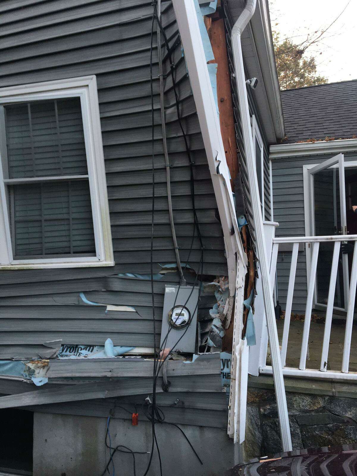 A driver crashed into a home on Oaklawn Avenue in Stamford, Conn., on Friday, Nov. 29, 2019.