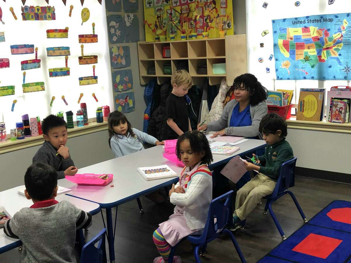 Miss Nikkie teaches her pre-K students Spanish at the Crossing Borders International Preschool in the Rice Village. The immersion school that teaches children 18 months through kindergarten opened a new building this fall and is planning to begin offering Arabic in next school year.