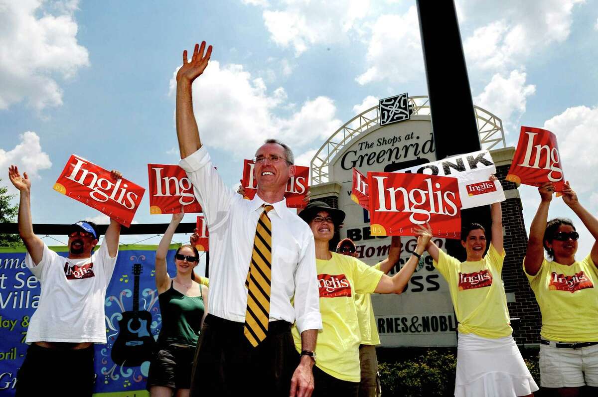 South Carolina congressional candidate Bob Inglis, center, along with some of his supporters stump for votes at The Shops of Greenridge in Greenville, S.C. Tuesday afternoon June 22, 2010. Inglis is in a runoff election with Trey Gowdy. (AP Photo/ Richard Shiro
