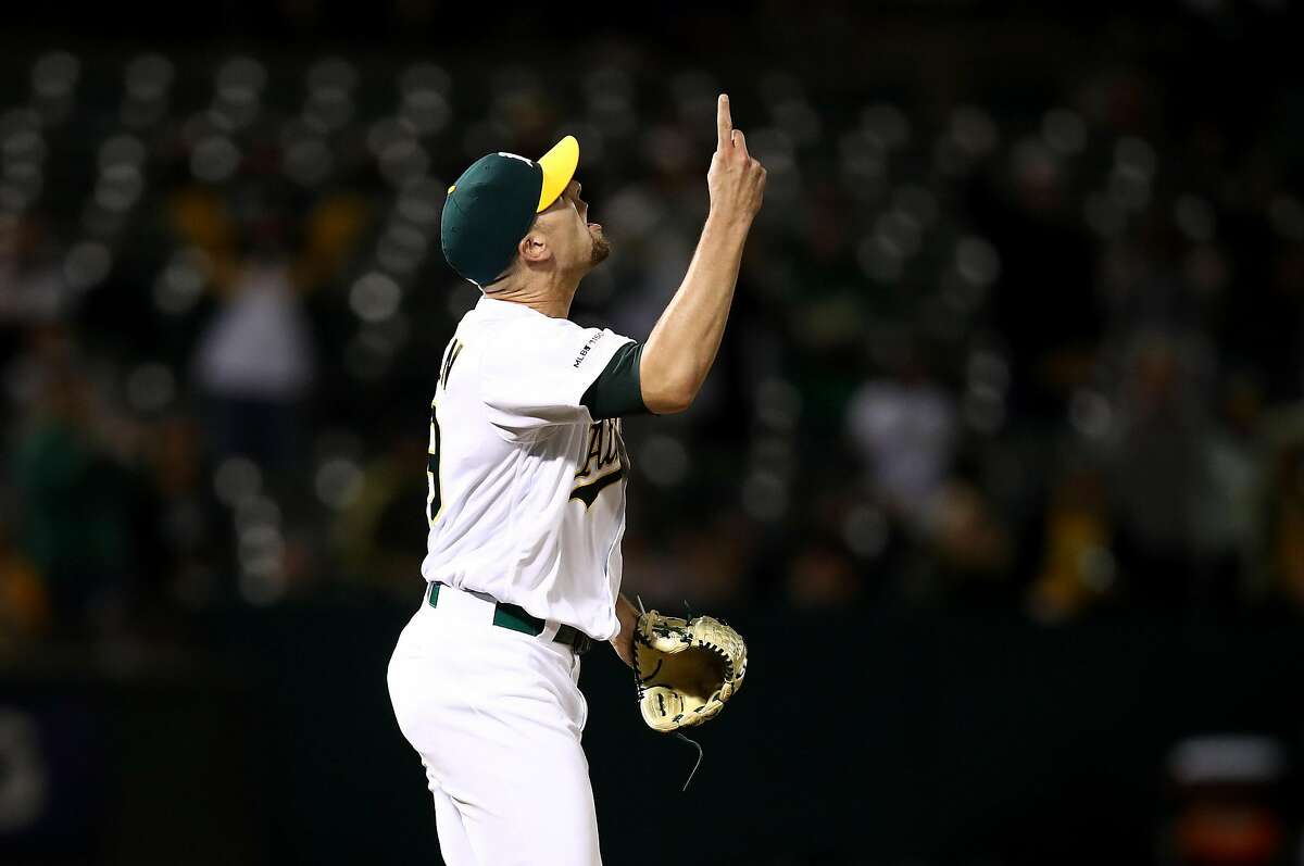 OAKLAND, CALIFORNIA - APRIL 17: Blake Treinen #39 of the Oakland Athletics points to the sky after they beat the Houston Astros at Oakland-Alameda County Coliseum on April 17, 2019 in Oakland, California. (Photo by Ezra Shaw/Getty Images)