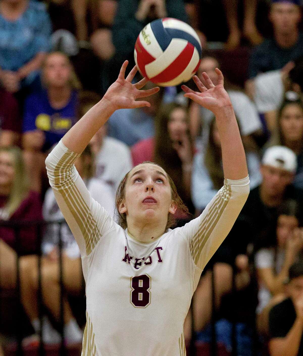 Alyssa May (8) of Magnolia West was selected as the District 19-5A Most Valuable Setter.