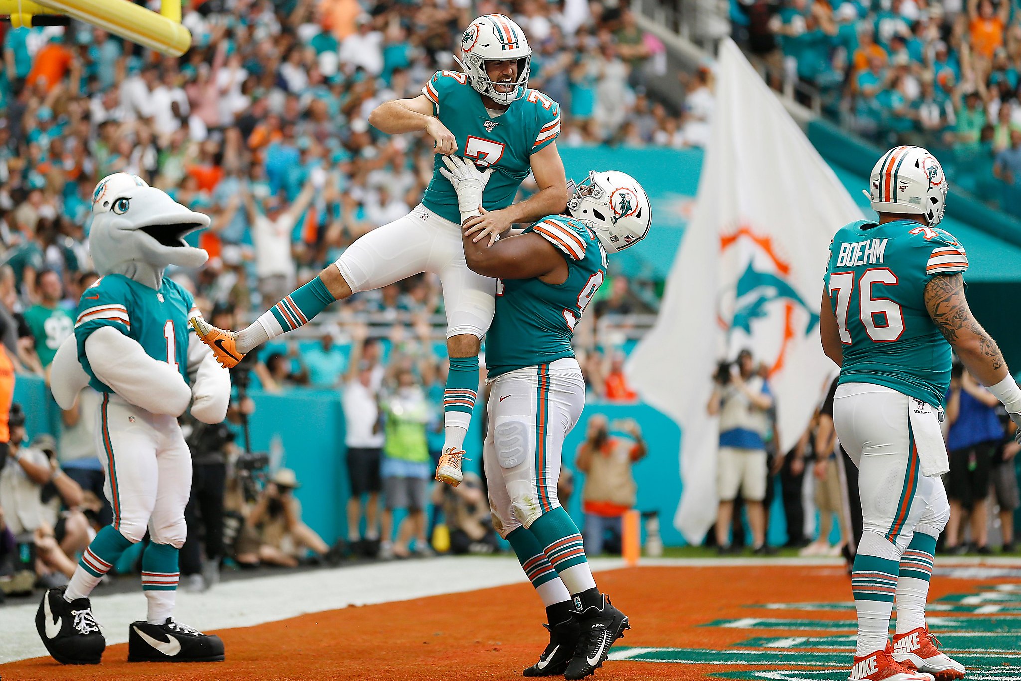 Mike Gesicki of the Miami Dolphins celebrates a catch against the News  Photo - Getty Images