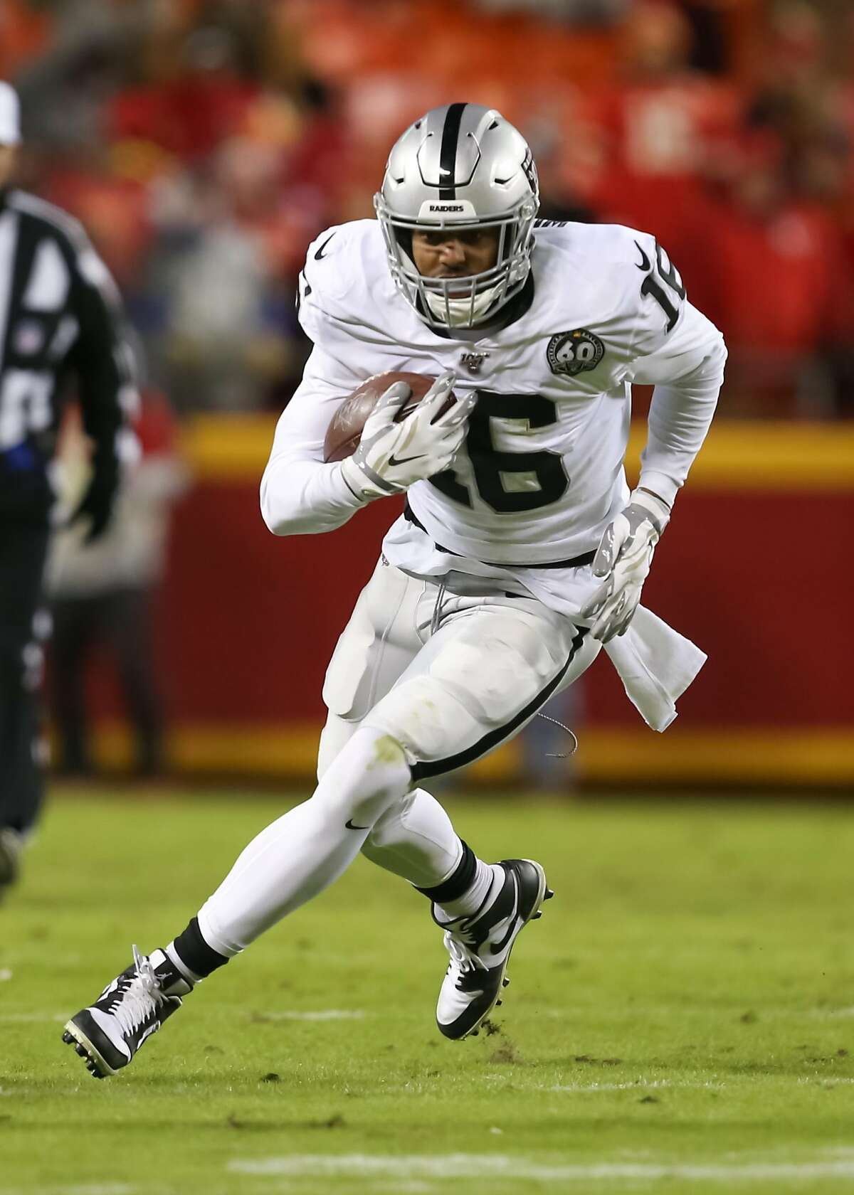KANSAS CITY, MO - DECEMBER 01: Oakland Raiders wide receiver Tyrell Williams (16) runs after the catch in the fourth quarter of an AFC West game between the Oakland Raiders and Kansas City Chiefs on December 1, 2019 at Arrowhead Stadium in Kansas City, MO. (Photo by Scott Winters/Icon Sportswire via Getty Images)
