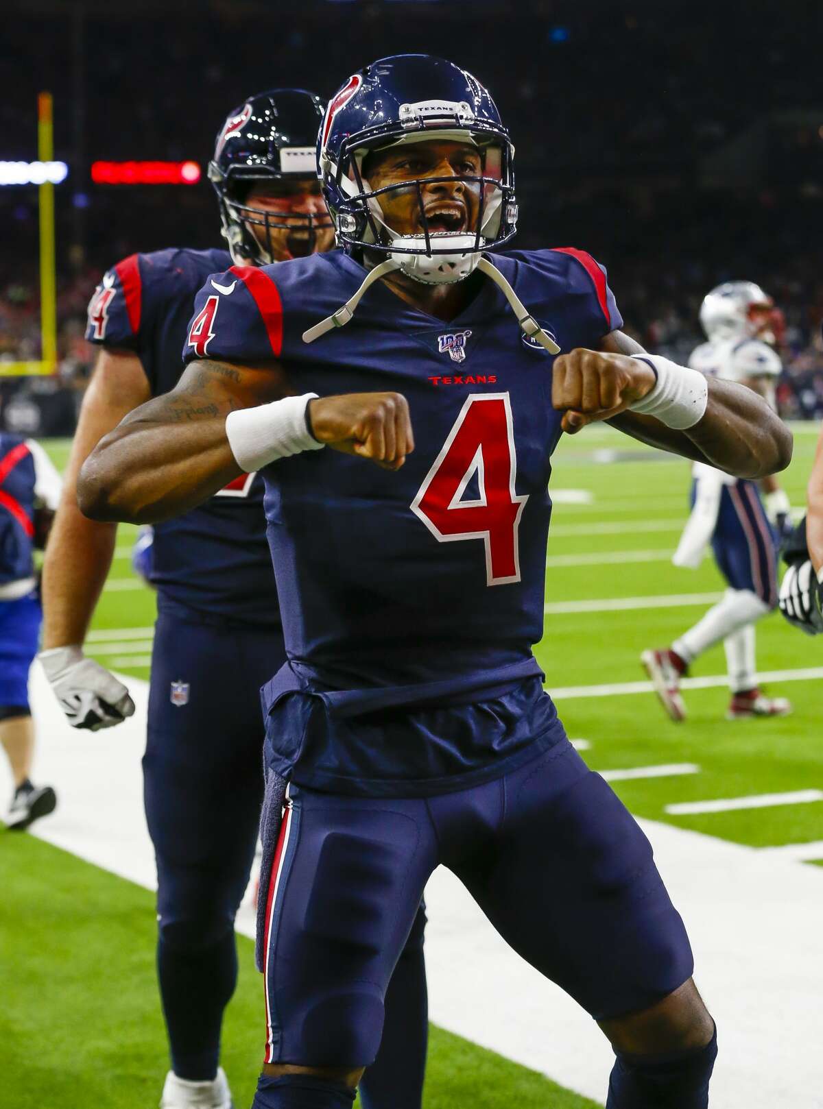 Houston Texans quarterback Deshaun Watson (4) celebrates his touchdown during the fourth quarter of an NFL football game at NRG Stadium on Sunday, Dec. 1, 2019, in Houston.