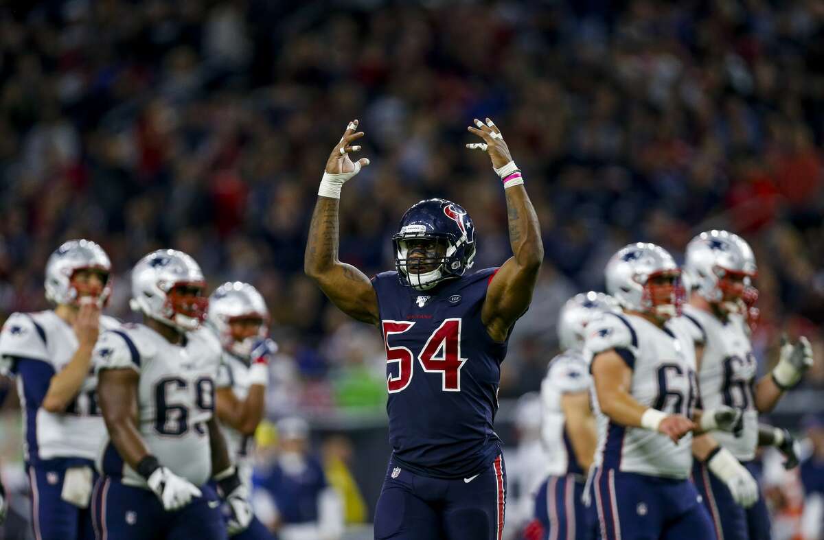 Houston Texans linebacker Jake Martin (54) appeals to the crowd during the fourth quarter of an NFL game at NRG Stadium Sunday, Dec. 1, 2019, in Houston.