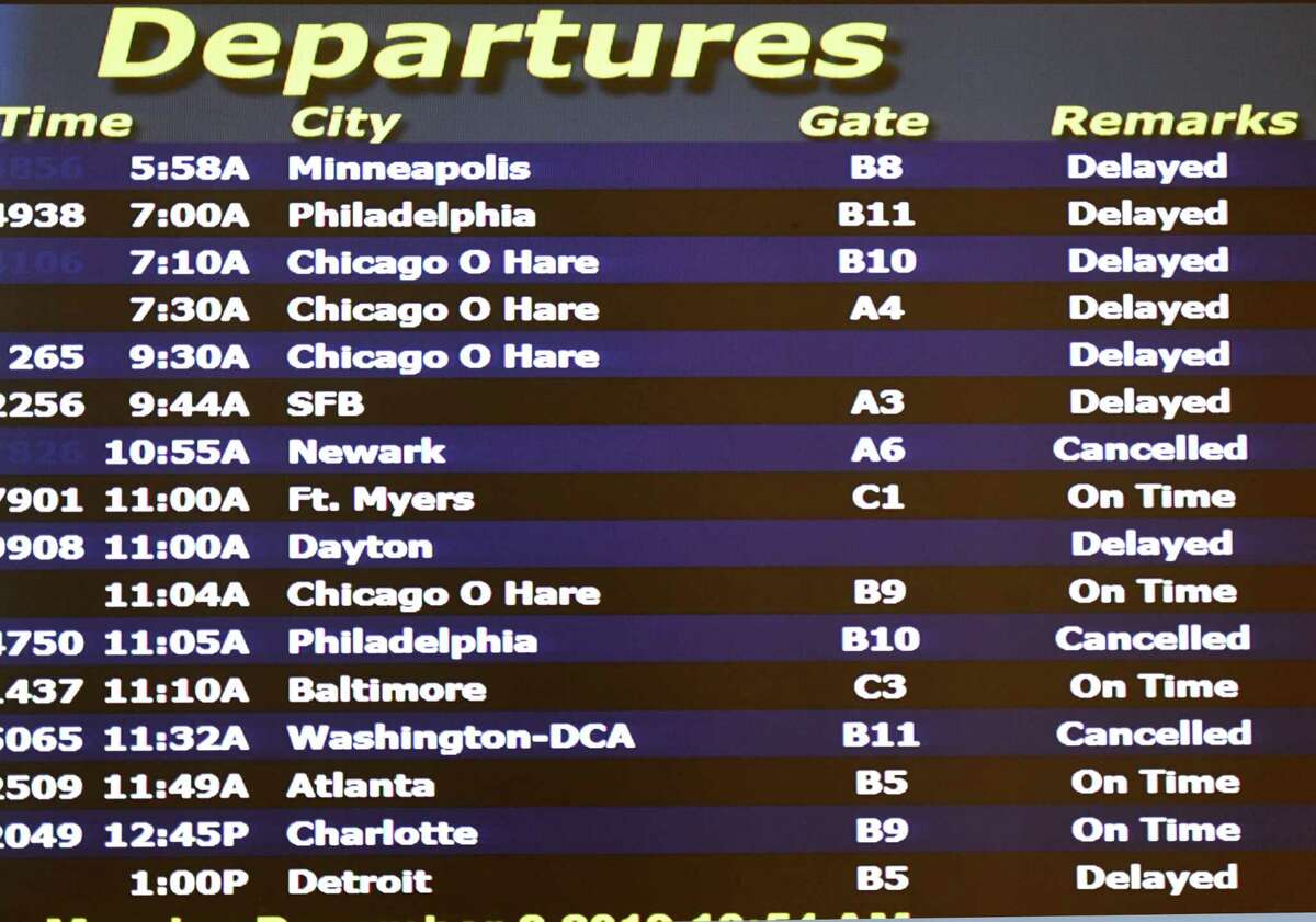 Flights are delayed or canceled at Albany International Airport as a slow-moving snowstorm sweeps through the Capital Region on Monday, Dec. 2, 2019, in Colonie, N.Y. (Will Waldron/Times Union)