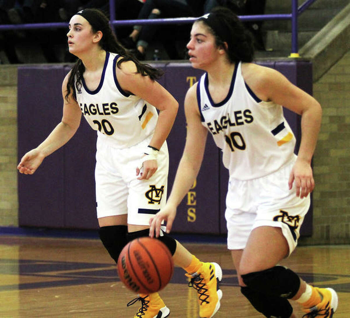 CM’s Kourtland Tyus (right) and Anna Hall bring the ball upcourt in a game last season at the Taylorville Tournament. Now back for their senior season, Tyus and Hall get their last shot at an elusive state tourney trip for the Eagles.