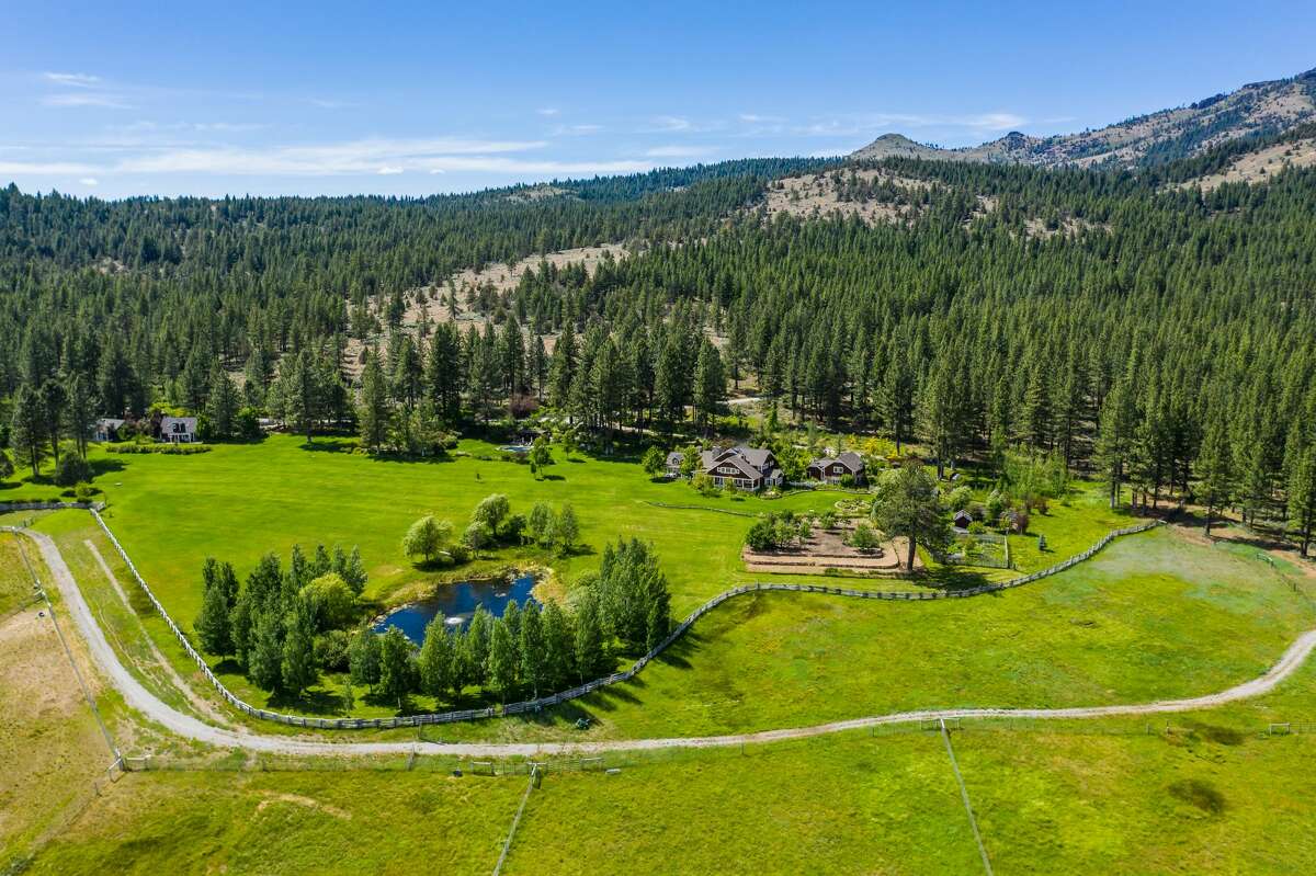 Situated in Plumas County among the northern Sierra Nevada, the 1,120-acre Spring Valley ranch features a 5,252-square-foot home with views of mountain peaks, rolling hills, lush gardens, beautiful lawns, and multiple ponds, according to listing agent Rodd Renfrew of California Outdoor Properties.