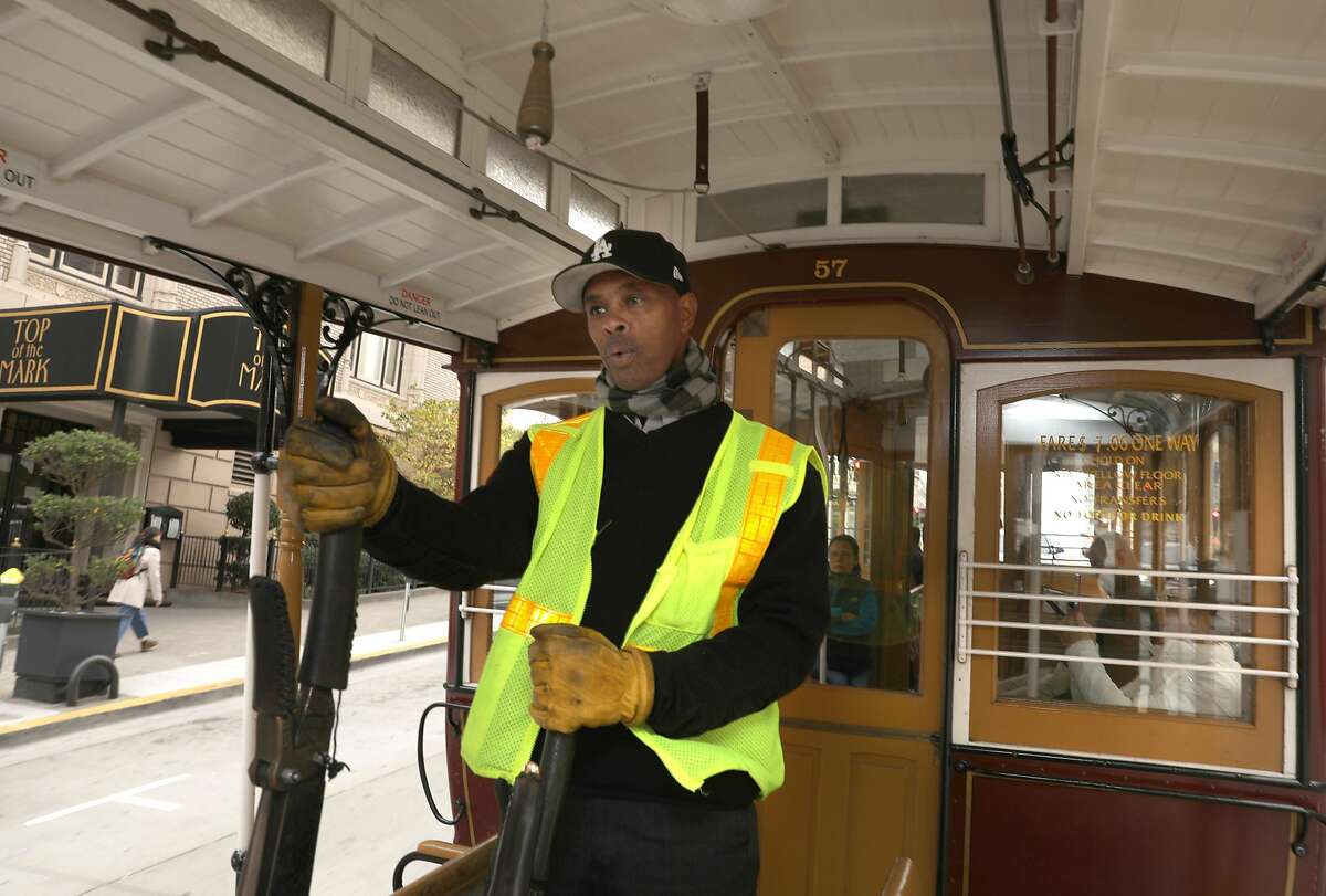 Reigning cable car bell ringing champion Byron Cobb seen working the California cable car line on Tuesday, Nov. 26, 2019, in San Francisco, Calif.