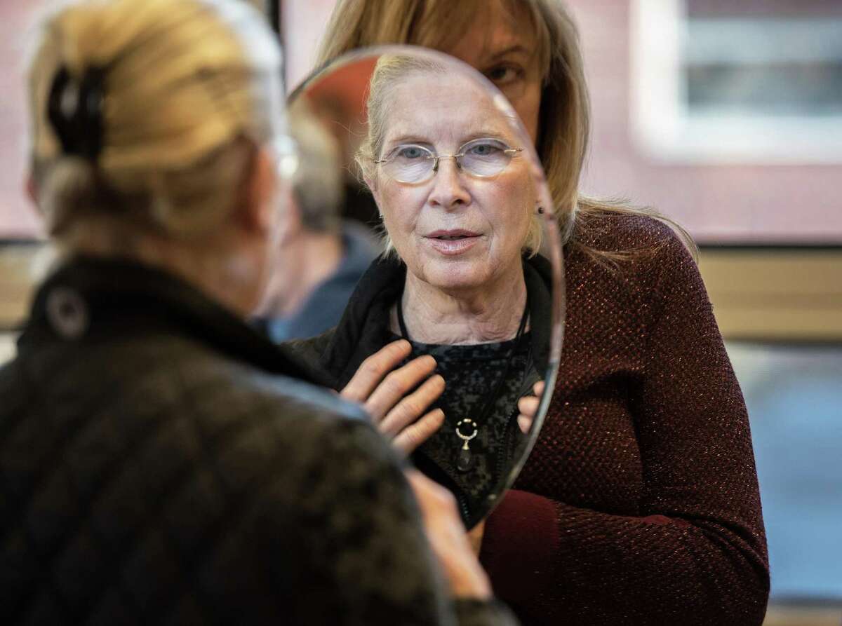 Pam Goehringer of Ridgefield checks out a necklace from Anita Begley Jewelry Design at The Ridgefield Woman's Club Craft Fair on Saturday 23, November 2019 in Ridgefield, Conn. Pam Goehringer of Ridgefield checks out a necklace from Anita Begley Jewelry Design at The Ridgefield Woman’s Club Craft Fair on Saturday 23, November 2019 in Ridgefield, Conn.