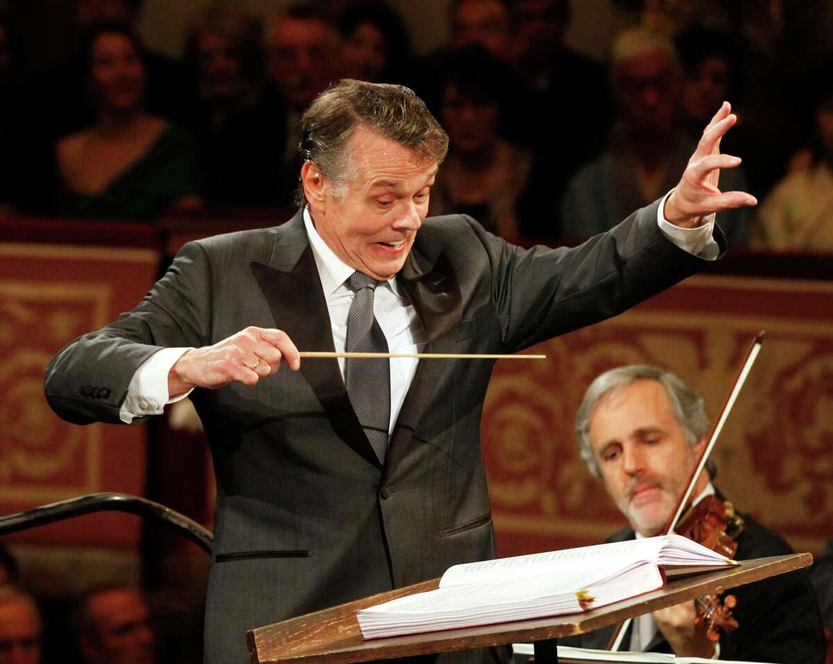 File---Picture taken Jan.1, 2012 shows Latvian conductor Mariss Jansons conducting the Vienna Philharmonic Orchestra during the traditional New Year's Concert at Vienna's Musikverein. Jansons died 76 years old. (AP Photo/Ronald Zak)