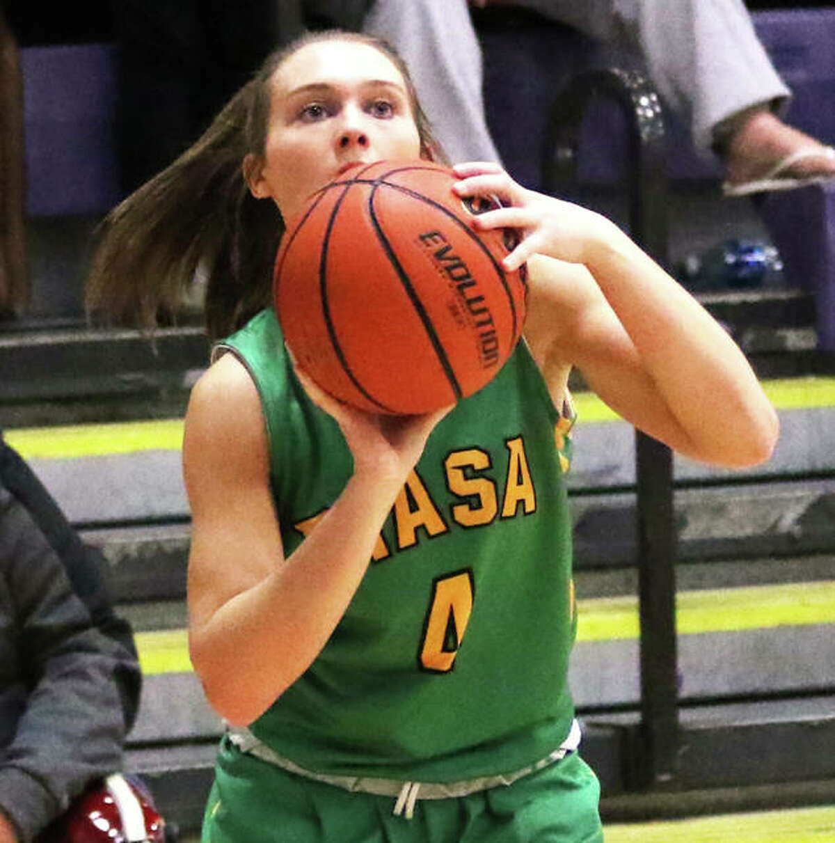 Southwestern’s Josie Bouillon eyes a 3-pointer during Saturday’s game at Litchfield. On Monday, Bouillon made four 3s and scored 14 points in the Piasa Birds win at Wood River.