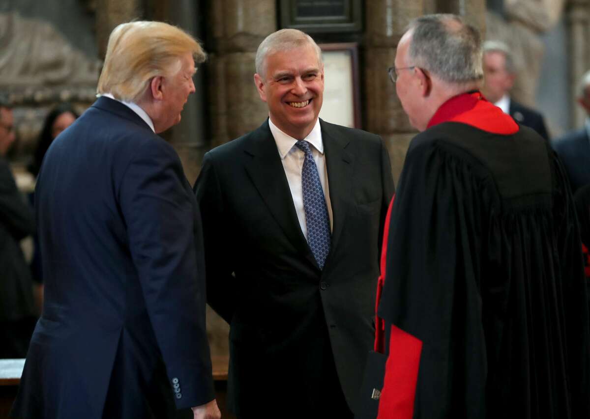 Prince Andrew, Duke of York smiles with US President Donald Trump (left) and Dean of Westminster John Hall (right) during the visit to Westminster Abbey on June 03, 2019 in London, England. President Trump's three-day state visit will include lunch with the Queen, and a State Banquet at Buckingham Palace, as well as business meetings with the Prime Minister and the Duke of York, before travelling to Portsmouth to mark the 75th anniversary of the D-Day landings.