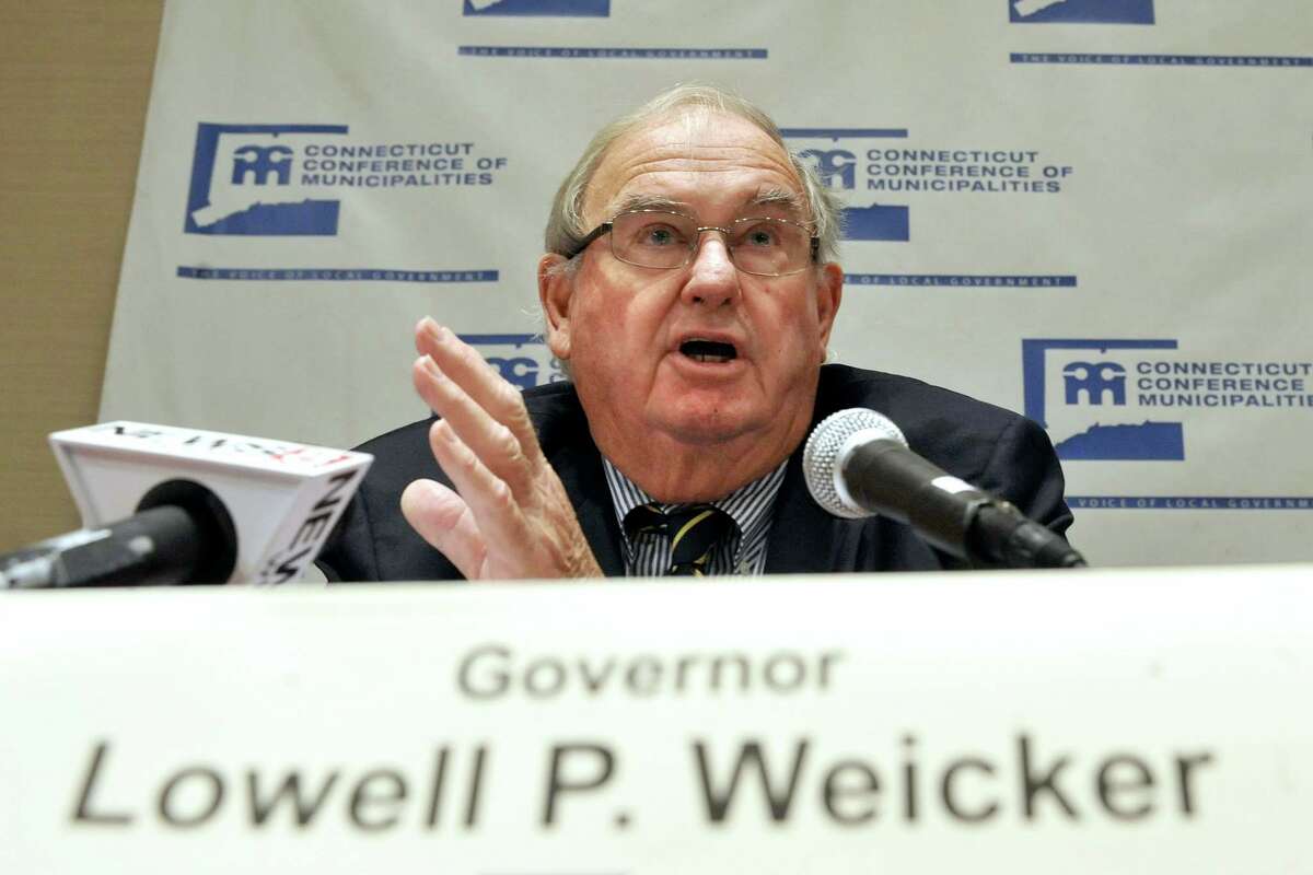 Former Connecticut Gov. Lowell P. Weicker Jr. speaks at an annual meeting of the Connecticut Conference of Municipalities in Cromwell, Conn., Thursday, June 17, 2010. Weicker says the next governor of Connecticut will need to make huge spending cuts, end borrowing, and renegotiate state union contracts to get a handle on the state's projected $3 billion-plus deficit. (AP Photo/Jessica Hill)