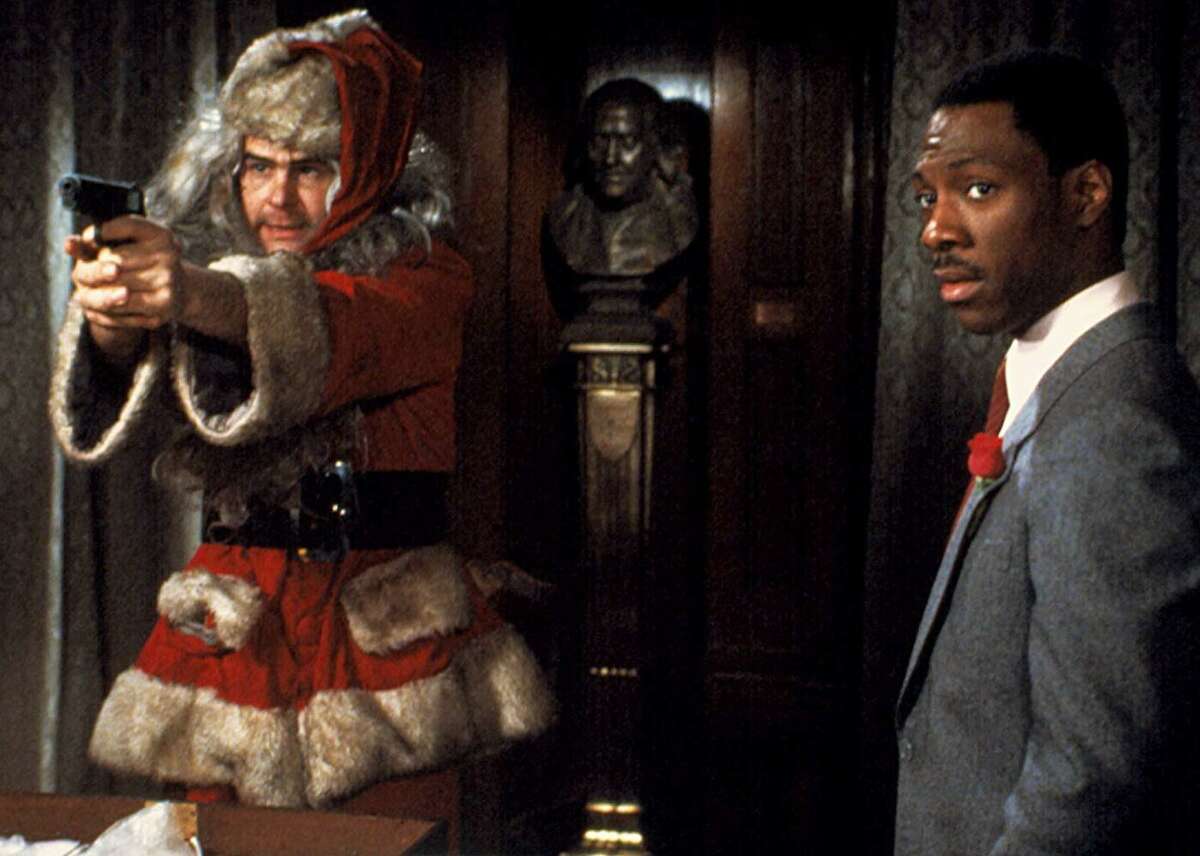 #25. Trading Places (1983) - Director: John Landis- Metascore: 69- IMDb user rating: 7.5- Runtime: 116 During the peak of his “Saturday Night Live” career, Eddie Murphy starred in “Trading Places,” one of his many 1980s film hits. Murphy plays Billy Ray Valentine, a street hustler who is groomed into a stockbroker to replace the educated Louis Winthorpe (Dan Aykroyd) as part of a bet between two mogul brothers. Winthorpe reaches his lowest point at a Christmas office party, but he and Valentine team up to take down the brothers playing with their lives with an elaborate and crowd-pleasing scheme. Despite some heavy subject matter and a few complicated details on stocks and finances, the film carries a light-hearted tone, with one of its famous sequences involving a gorilla on a train, of all possible things. This slideshow was first published on theStacker.com