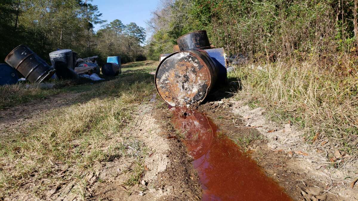 Hazmat units called in to clean up dumped chemical barrels in Houston area