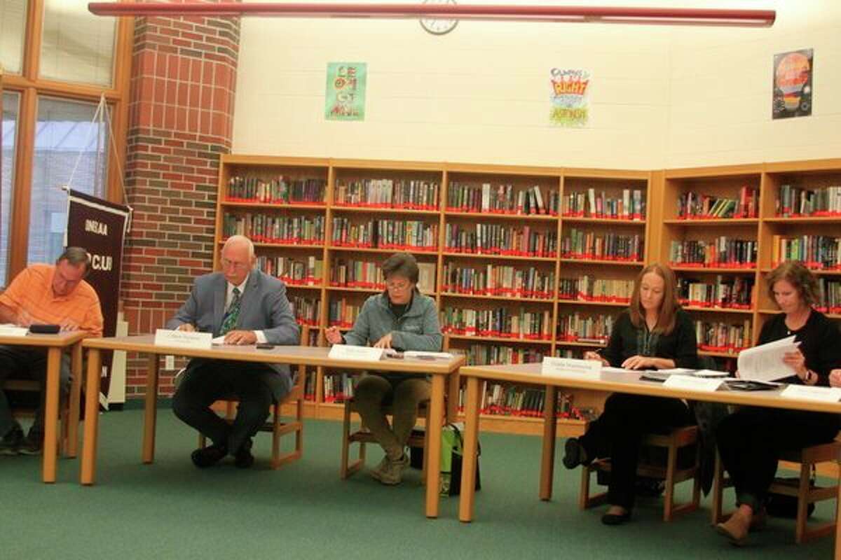 It appears that Mark Parsons (second from left) may be remaining on as interim superintendent at Onekama Consolidated Schools for longer than expected. Board members are have indicated due to financial shortfalls from switching to being an out-of-formula school district they are in a holding pattern when it comes to hiring a new full time superintendent.(File photo)