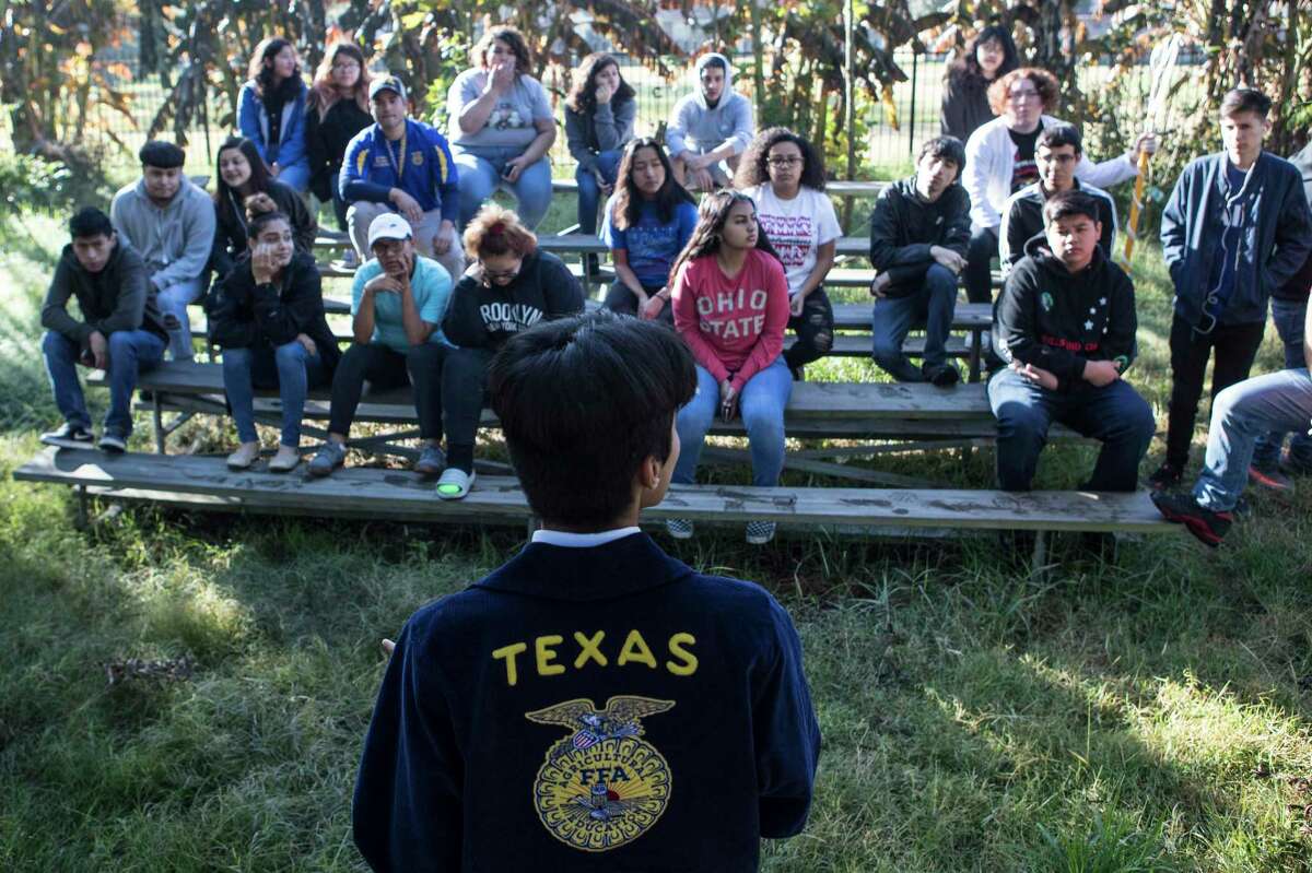 Juan Gallegos talks to Furr High School FFA group as they arrive to the community garden near the school on Tuesday, Nov. 19, 2019, in Houston. Furr, in northeast Houston, has become the first environmental justice school in the country thanks to a $10 million grant it won in 2016. The students focus on different environmental issues to become more involved in their community and collaborate with area organizations.
