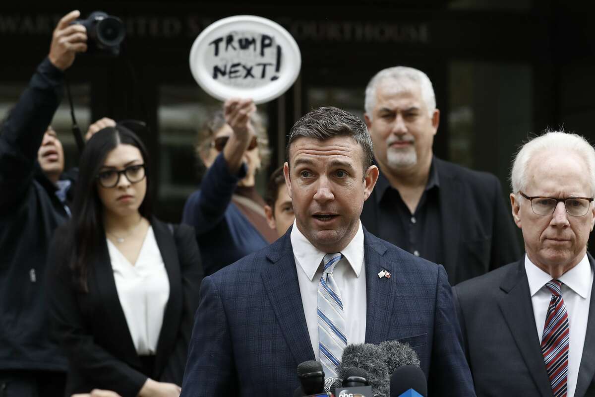 California Republican Rep. Duncan Hunter speaks after leaving federal court Tuesday, Dec. 3, 2019, in San Diego. Hunter said in a TV interview that aired Monday he plans to plead guilty to the misuse of campaign funds at a federal court hearing Tuesday in San Diego. (AP Photo/Gregory Bull)