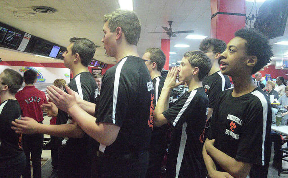 The Edwardsville boys bowling team watches the action during Tuesday’s Southwestern Conference dual match against Alton at Bowl Haven Lanes.