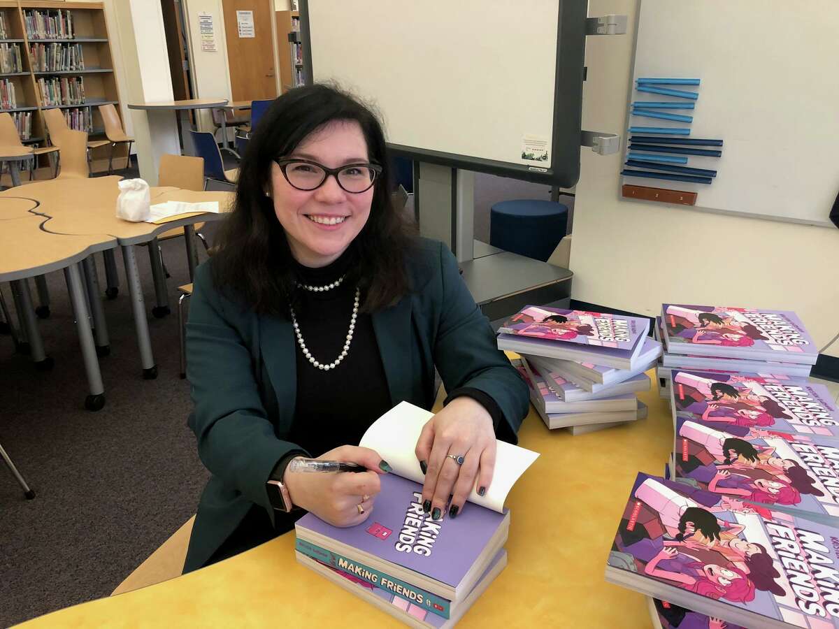 Kristen Gudsnuk returned to Sunnyside School for the first time Wednesday to talk to the students about creating comic books and herexperiences.
