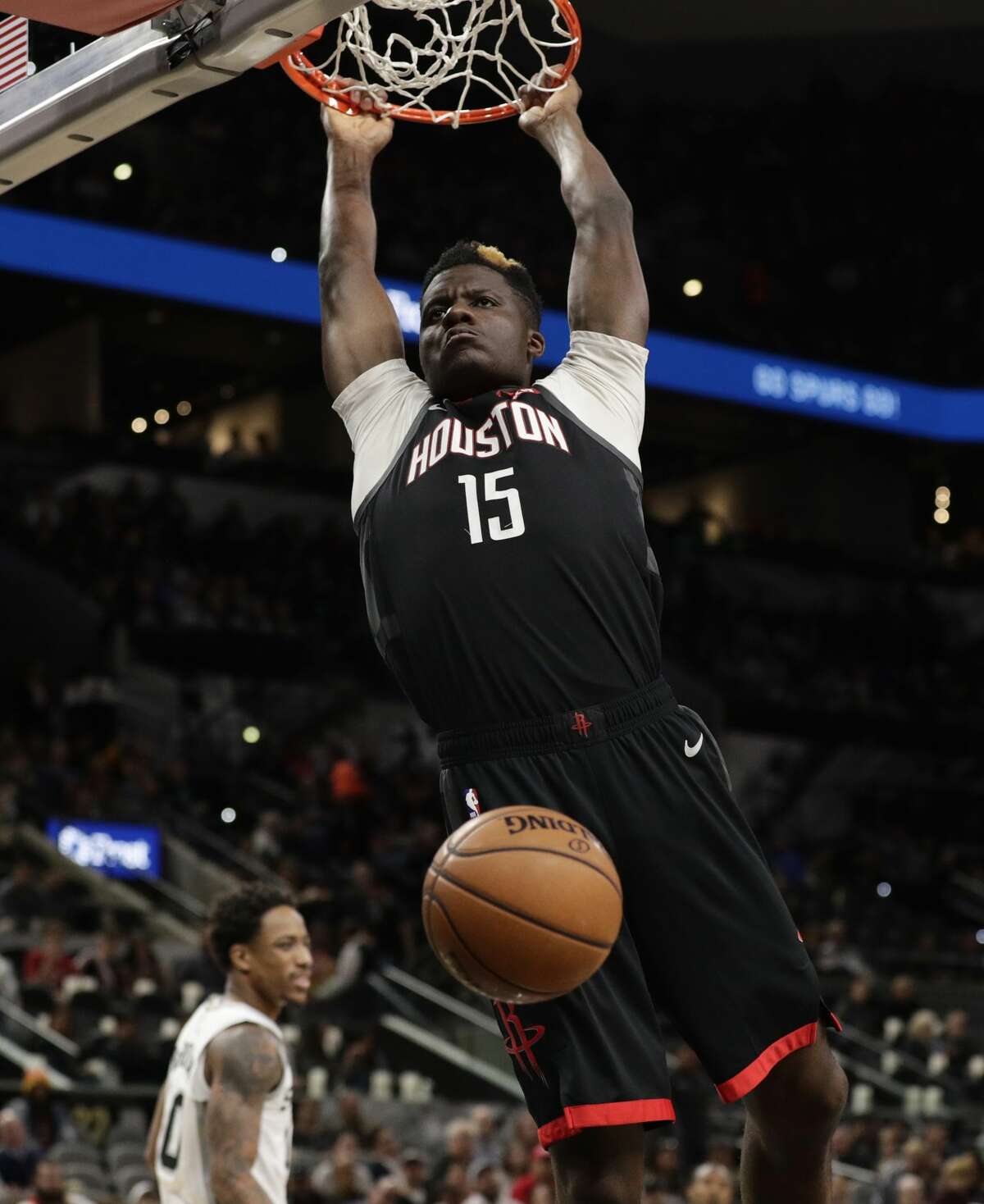 Houston Rockets center Clint Capela scores against the San Antonio Spurs during the first half of an NBA basketball game in San Antonio, Tuesday, Dec. 3, 2019. (AP Photo/Eric Gay)