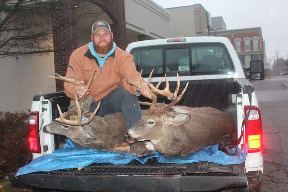 Reed City's Jason May shoots two impressive bucks during the firearm season. (Herald Review photo/John Raffel)