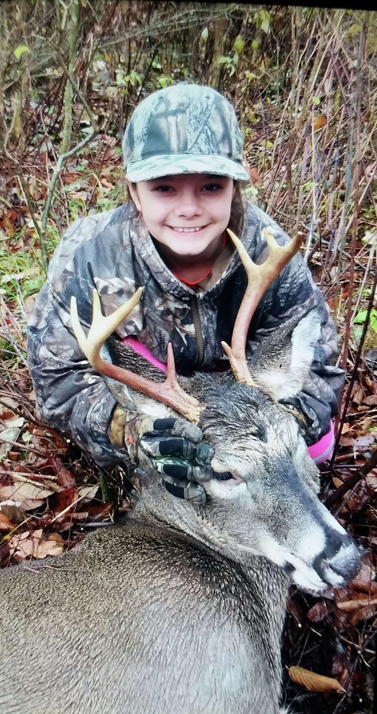 Julianna Follo, age 11, 1st deer ever, 8 point, bow season. Manistee County.