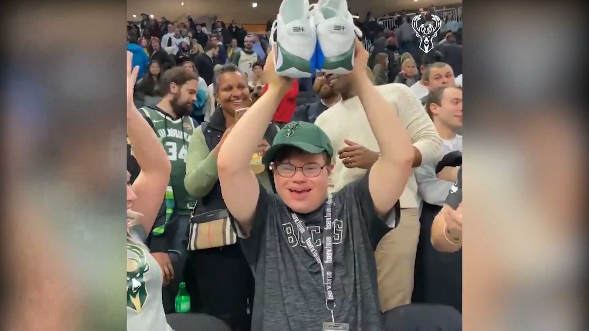 giannis antetokounmpo giving shoes