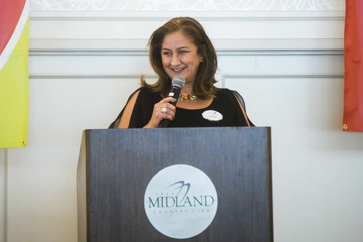 Julie Nunn, executive director for Cancer Services of Midland, speaks during the organization's 28th Annual Holiday Luncheon & Style Show Wednesday, Dec. 4, 2019 at Midland Country Club. (Katy Kildee/kkildee@mdn.net)