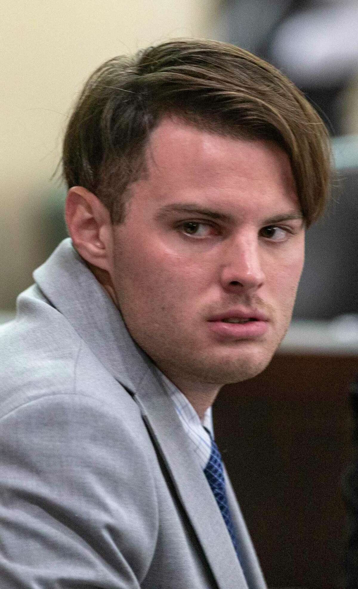 Mark Howerton looks Wednesday, Dec. 4, 2019 around the 144th state District Court in the Cadena-Reeves Criminal Justice Center during testimony during his murder trial. Howerton is alleged to have beaten Cayley Mandadi, a 19-year-old Trinity University cheerleader, to death in 2017.