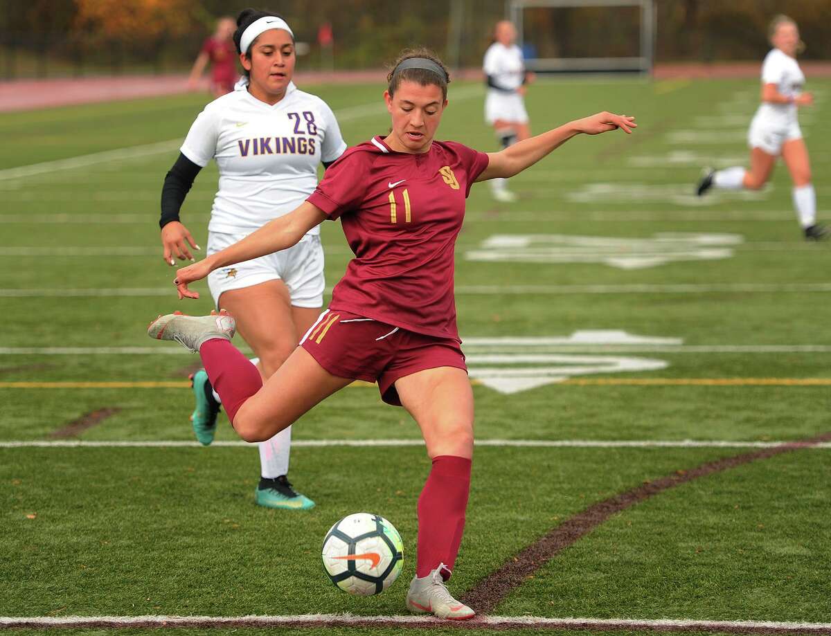 St. Joseph's Maddie Fried fires a shot on goal during the first half of her team's victory over Westhill in the Class LL girls soccer state tournament at St. Joseph High School in Trumbull, Conn. on Monday, November 5, 2018.