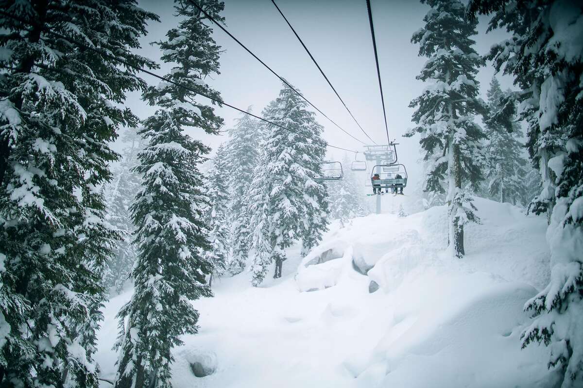 Skiers enjoy a foggy day at Sierra At Tahoe Resort, Calif. on December 4th, 2019.