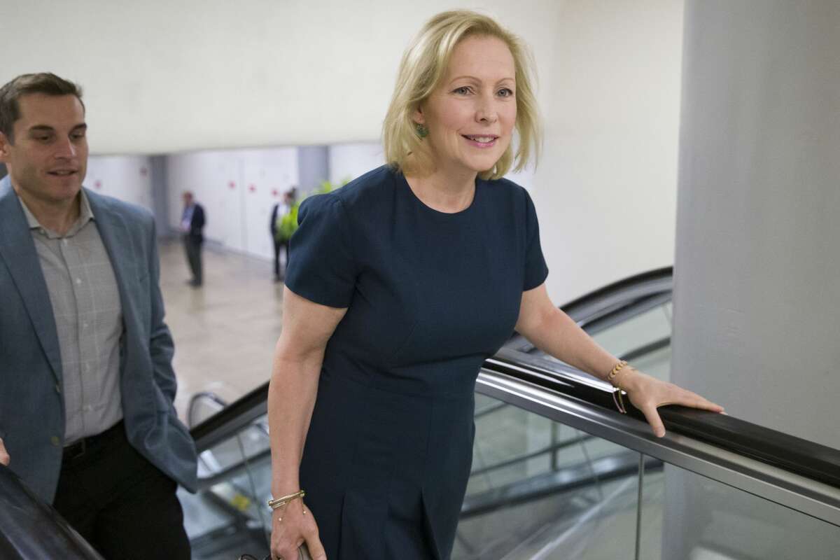 Sen. Kirsten Gillibrand, D-N.Y., right, heads to the Senate for a vote, on Capitol Hill, Tuesday, Sept. 24, 2019 in Washington.