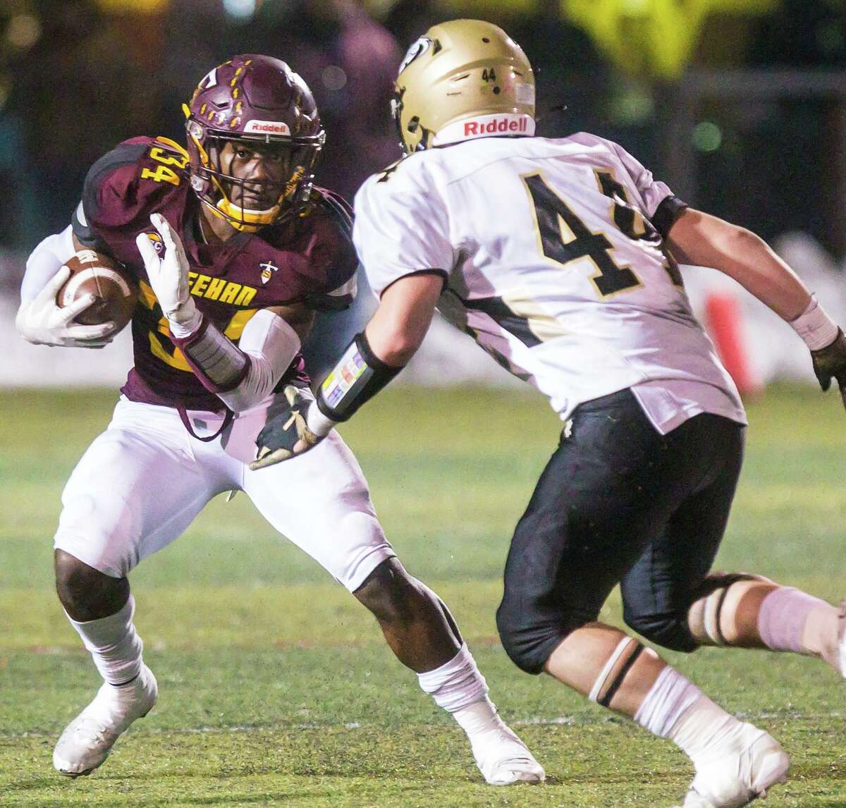 Sheehan’s Terrence Bogan looks to make a move to get past Woodland defender Benjamin Brooks during their Class S quarterfinal game no Wednesday.