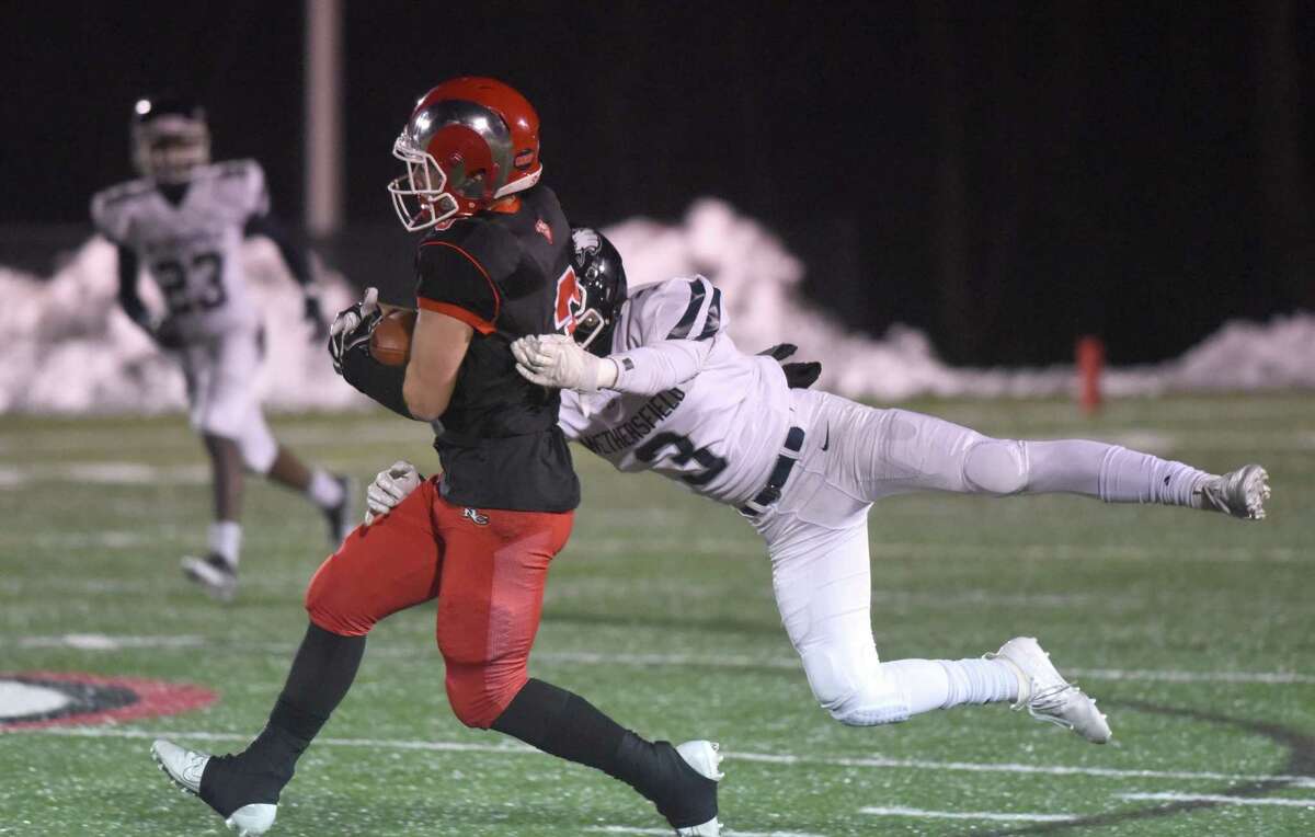 Pyne’s 300 passing yards leads New Canaan past Wethersfield