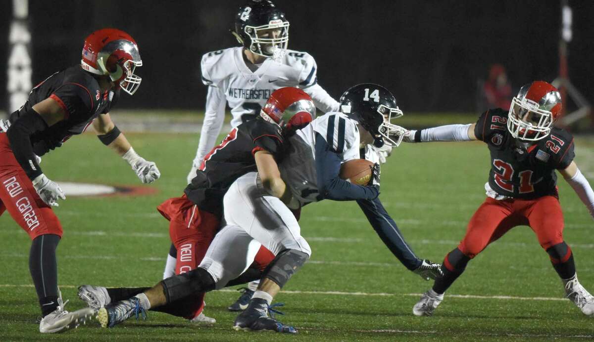 Pyne’s 300 passing yards leads New Canaan past Wethersfield