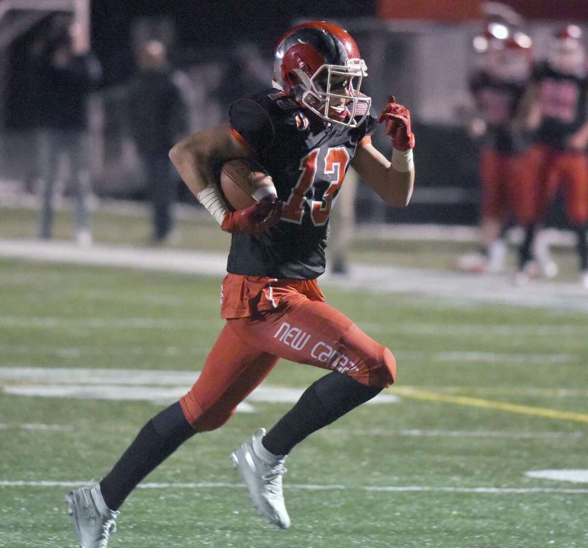 Pyne’s 300 passing yards leads New Canaan past Wethersfield