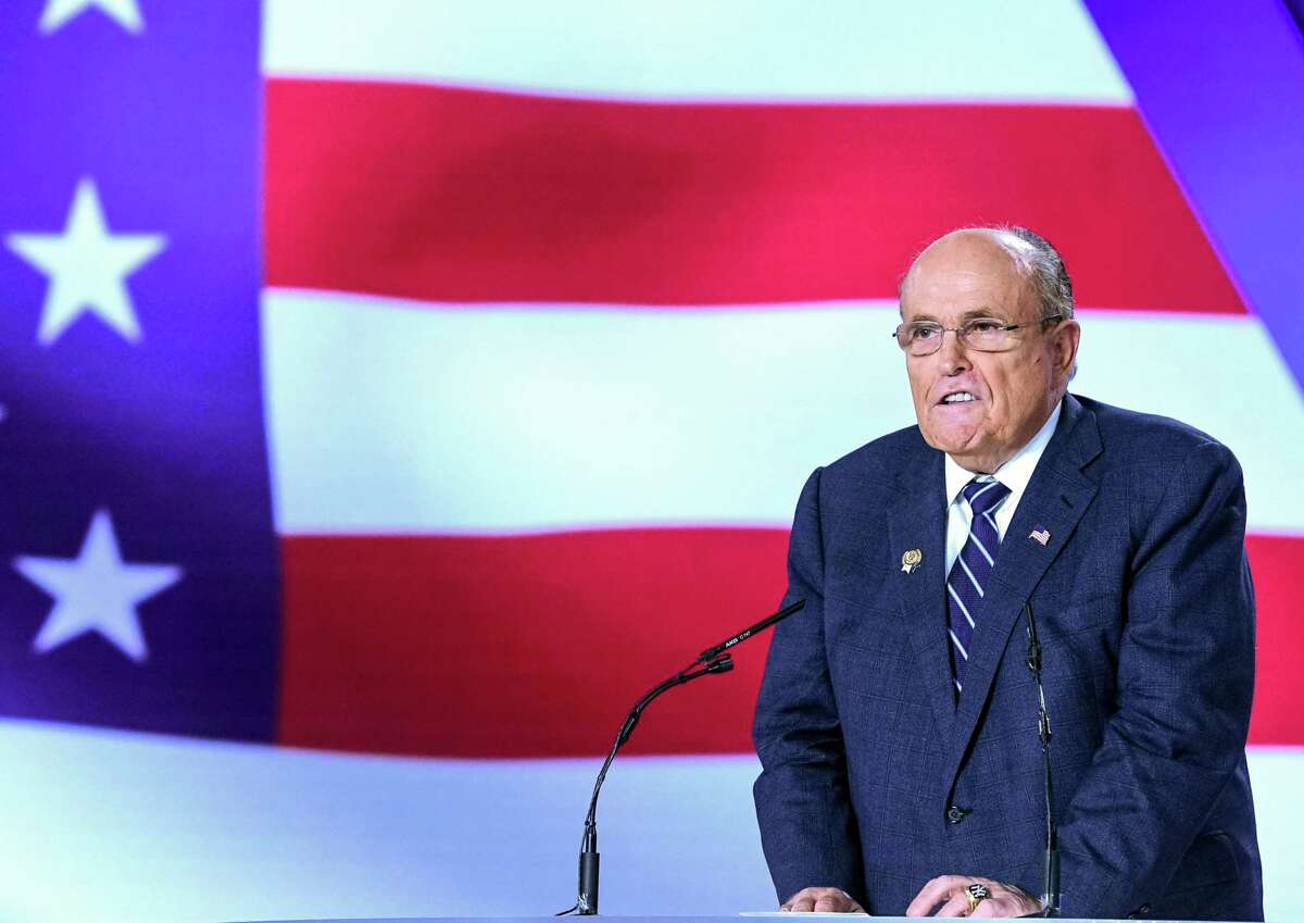 Former New York City Mayor Rudy Giuliani speaks during a conference in Manza, Albania.