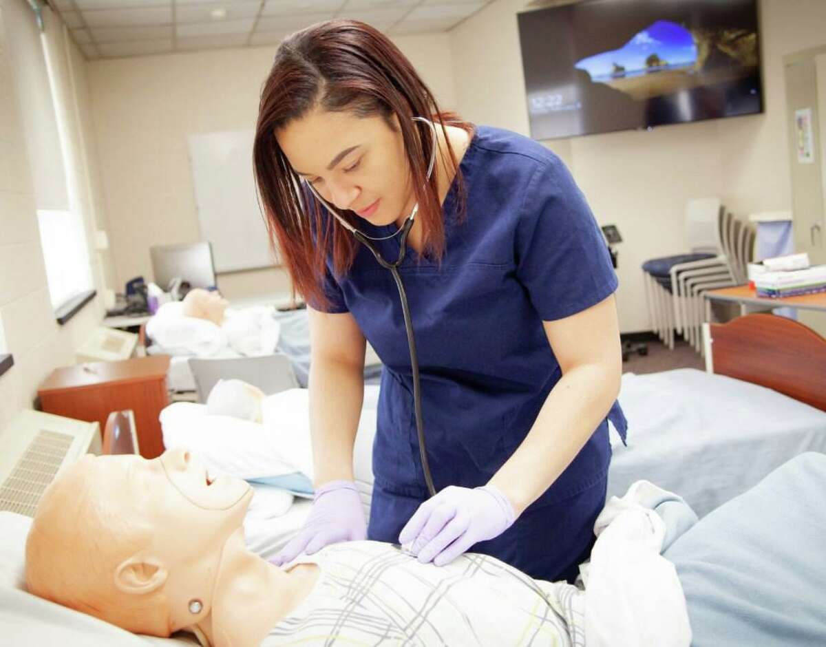 Saturday is “Enroll in a Day” at Middlesex Community College in Middletown. Registration is open from 9 a.m. to 2 p.m. at 100 Training Hill Road. Shown here is a CNA student.