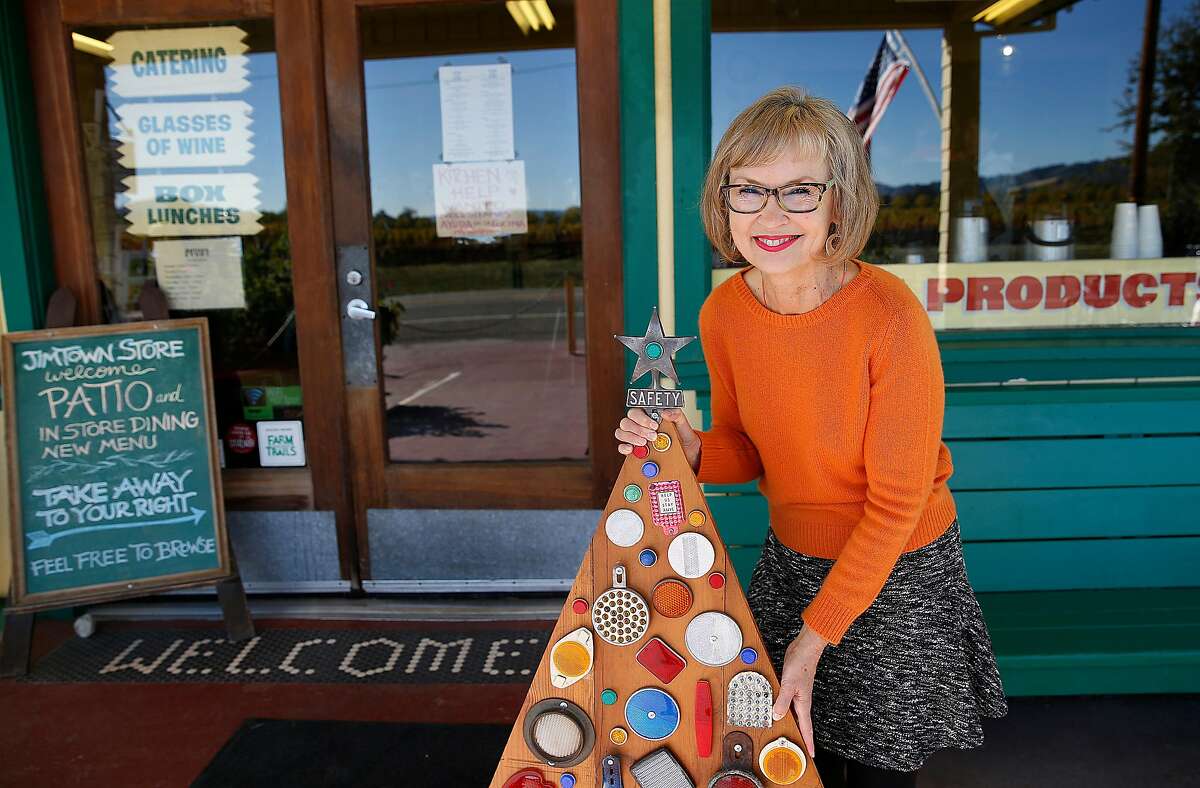 Jimtown store owner Carrie Brown, author of "The New Christmas Tree", shows her first tree in Healdsburg, California, on Wednesday, November 11, 2015.
