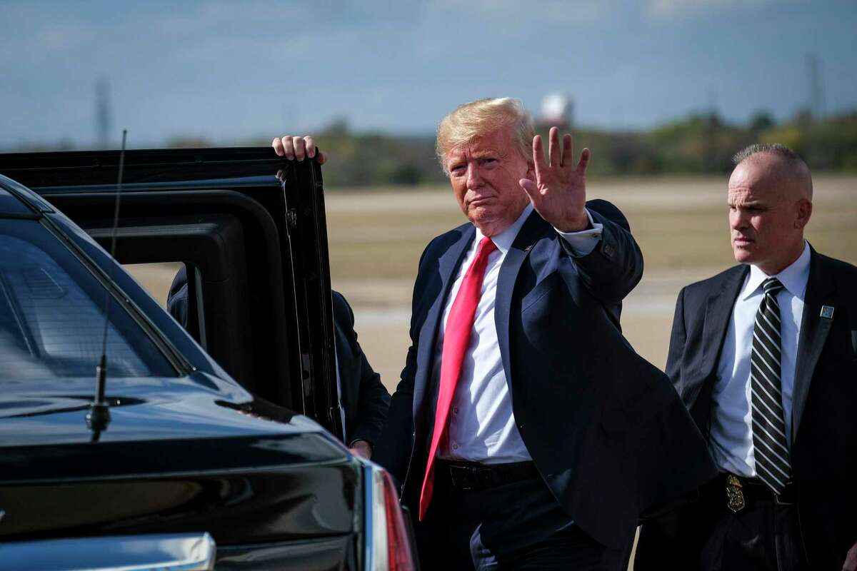 President Donald Trump waves to the media after disembarking from Air Force One in Austin, Texas, on Wednesday, Nov. 20, 2019. The White House and Senate Republicans are divided over whether to embrace a lengthy trial that could give the president's allies a chance to mount an elaborate defense of his conduct before a polarized nation, or to move quickly to dispense with charges against him. (Pete Marovich/The New York Times)