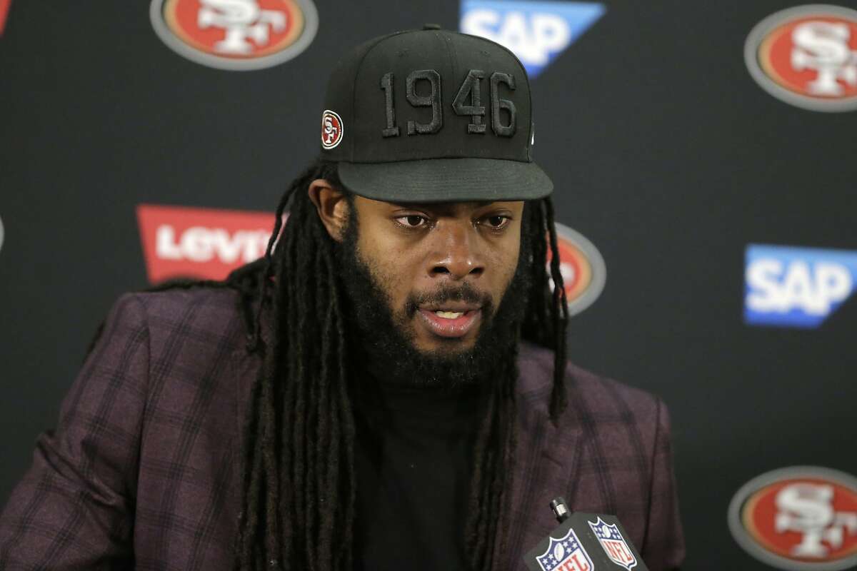 San Francisco 49ers cornerback Richard Sherman talks to reporters after an NFL football game against the Baltimore Ravens, Sunday, Dec. 1, 2019, in Baltimore. The Ravens won 20-17. (AP Photo/Julio Cortez)