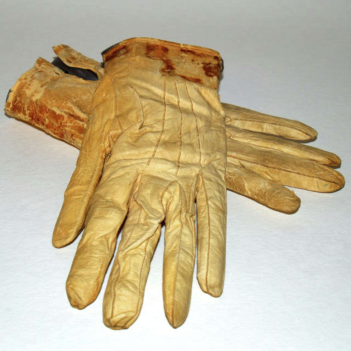 These blood-stained gloves that were in Abraham Lincoln’s pocket when he died are among the artifacts the Abraham Lincoln Presidential Library Foundation borrowed $23 million in 2007 to purchase.