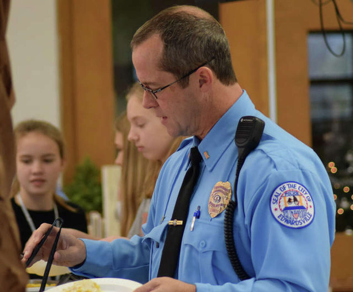 Edwardsville first responders and Lincoln Middle School students share stories and conversations on Thursday during the school’s annual luncheon.