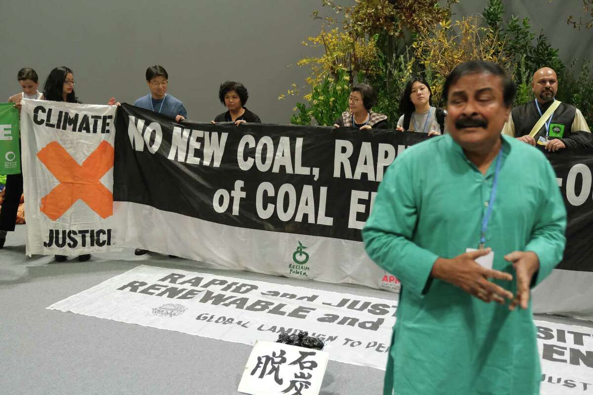 MADRID, SPAIN - DECEMBER 04: Activists protesting against the expansion of coal-based energy production in Asia hold a small demonstration on day three at the UNFCCC COP25 climate conference on December 4, 2019 in Madrid, Spain. The conference brings together world leaders, climate activists, NGOs, indigenous people and others together for two weeks in an effort to focus global policy makers on concrete steps for heading off a further rise in global temperatures. (Photo by Sean Gallup/Getty Images)