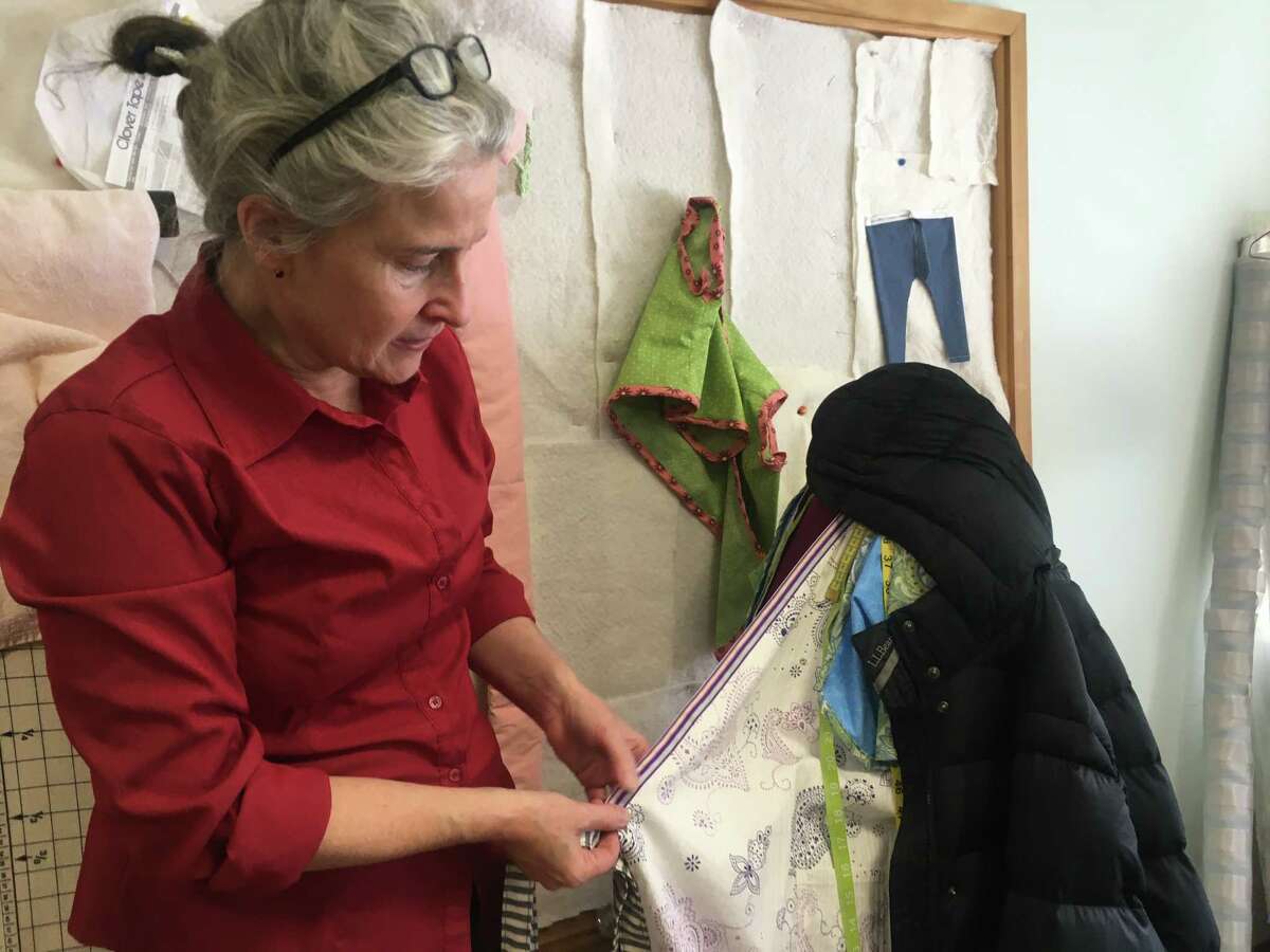 Linda Feldmann, the project coordinator for Literacy Volunteers of Rensselaer County, says students start with small projects like bags and pillow cases, and then work their way up to sewing garments as a part of a program that teaches the English language to immigrants along with sewing and workplace skills at St. Andrew's Episcopal Church in Albany. (Rebecca Carballo/Times Union)